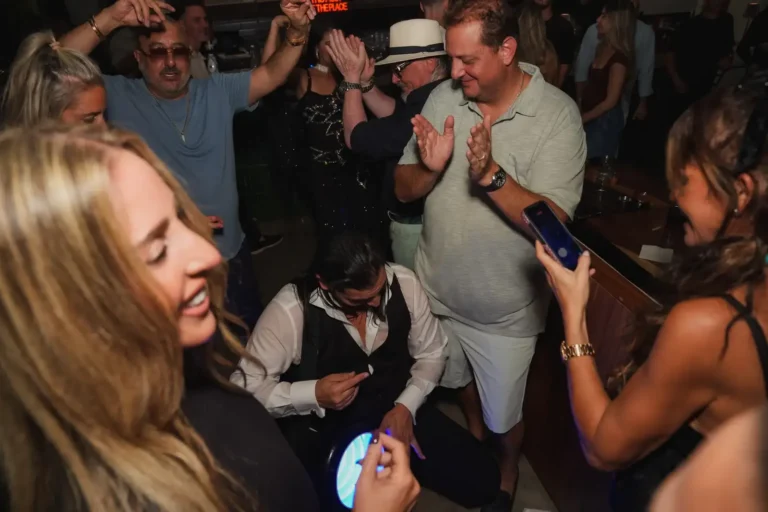 Celebrating crowd at BACAR Taverna Nights