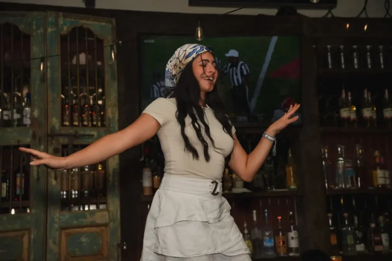 Guests dancing at Taverna Nights in Dania Beach
